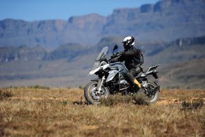 A BMW 1200 GS with the Drakensberg in the background.