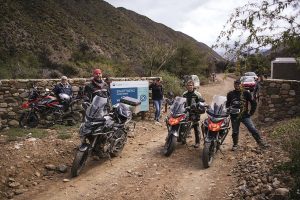 Four Zontes 310T bikes and their riders, with a Cape Nature sign in the background