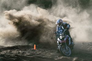 A 1200GS rider shows skill in the soft sand